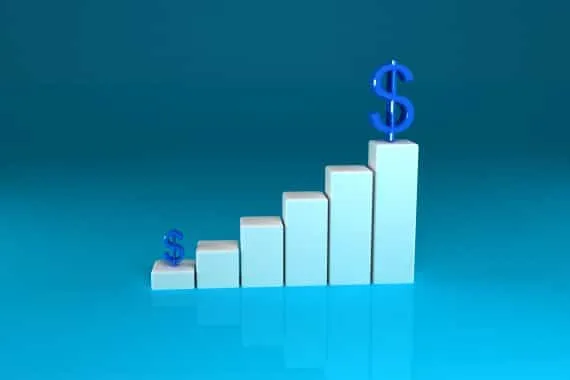 Um gráfico de barras crescente contém dois cifrões no topo da barra menor, no início, e da barra maior, no fim. A ilustração demonstra as vantagens de uma empresa aplicar a terceirização por BPO Financeiro.